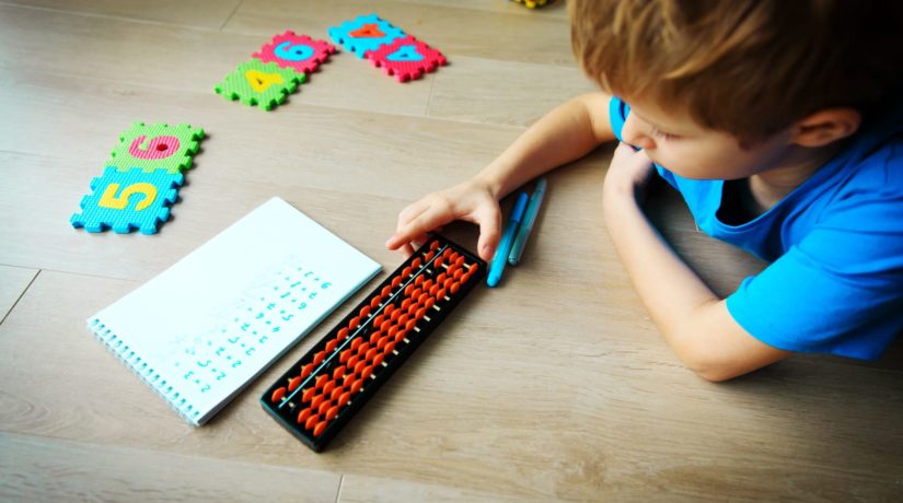 little boy learning numbers, mental arithmetic, abacus calculation